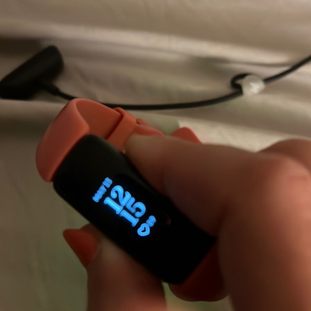 Pink Fitbit inspire 2 brand new condition no flaws with charger